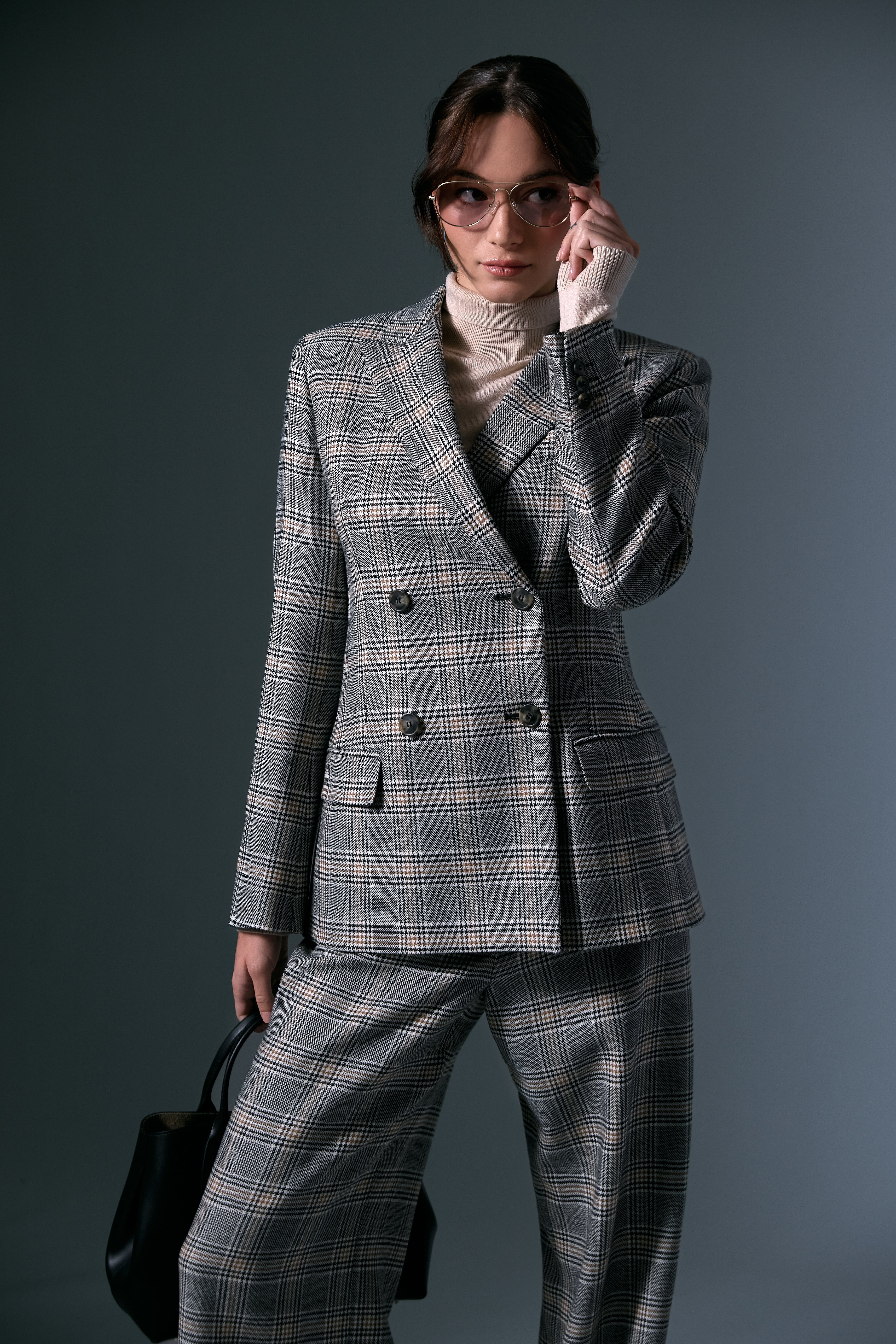 The Rivolo Patterned Wool Blazer, Katana Long Trouser, and Kiku Silk and Wool Polo Neck Sweater by Max Mara Weekend, styled with the Mabuhay Matte Gold Reading Glasses by Caddis and Le Roseau M Handbag by Longchamp 