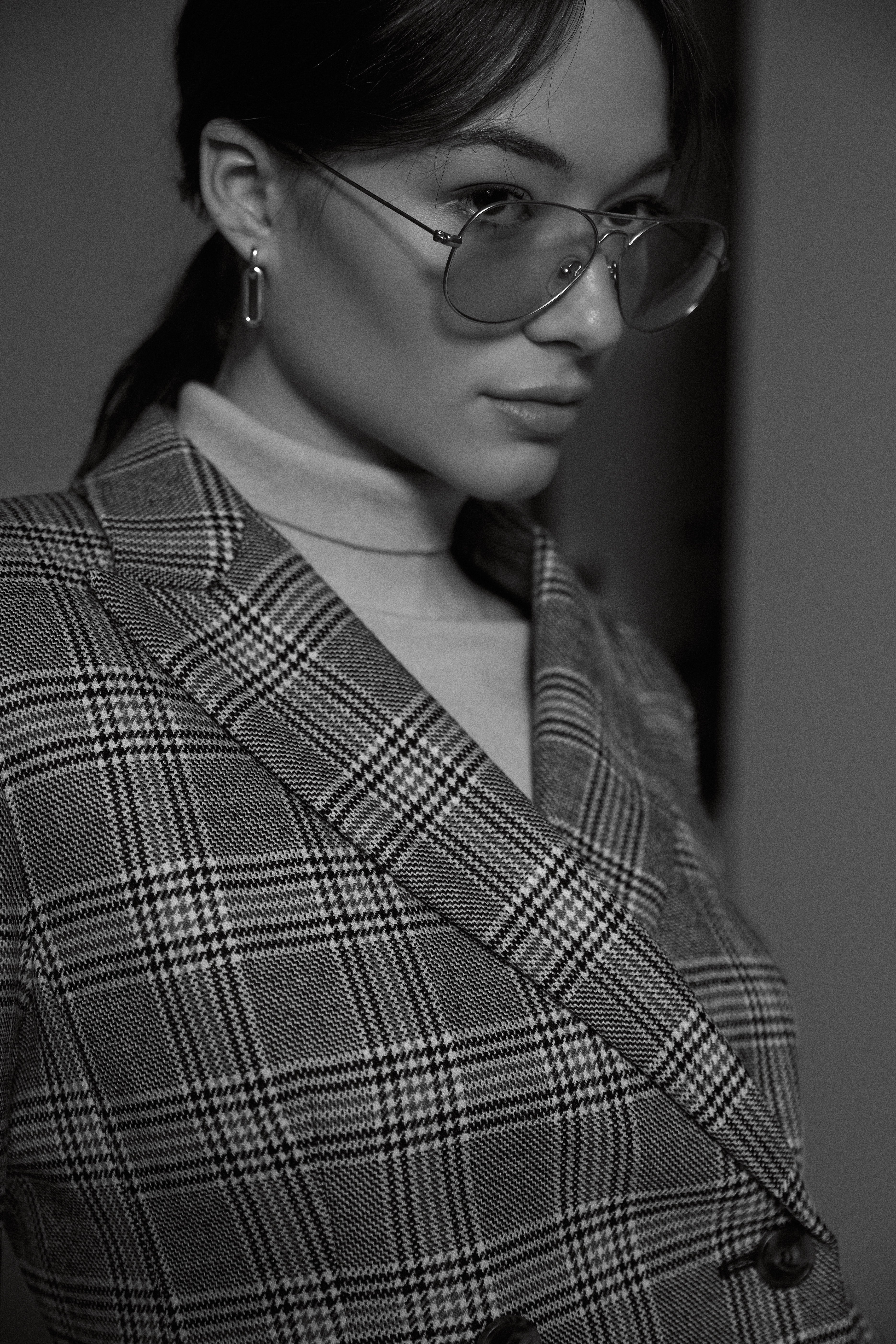 The Rivolo Patterned Wool Blazer and Kiku Silk and Wool Polo Neck Sweater by Max Mara Weekend, styled with the Mabuhay Matte Gold Reading Glasses by Caddis and the Teeni Detachable Link Earrings by Jenny Bird