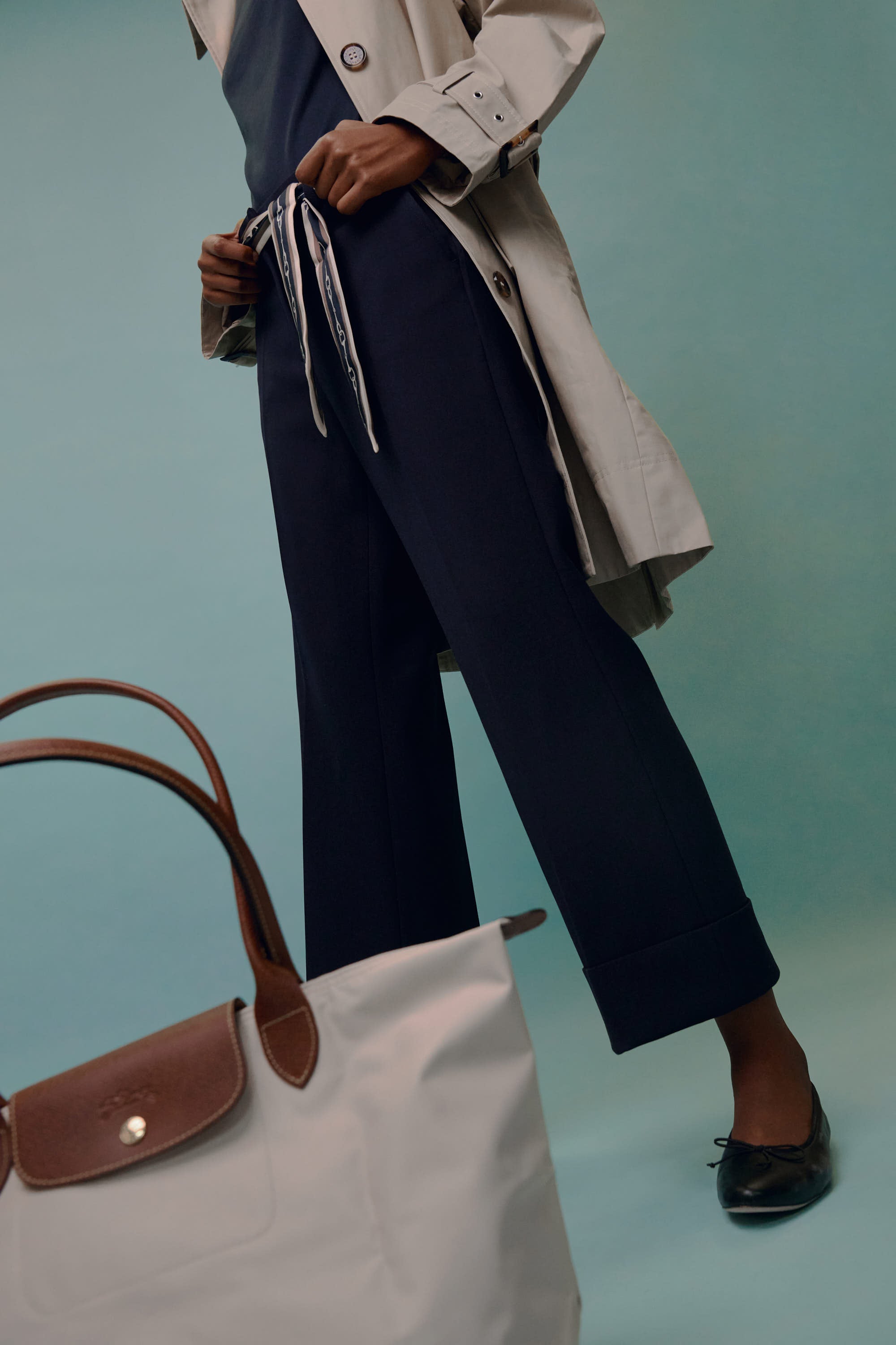 cambio france trousers with a barbour trench coat and the longchamp le pliage bag