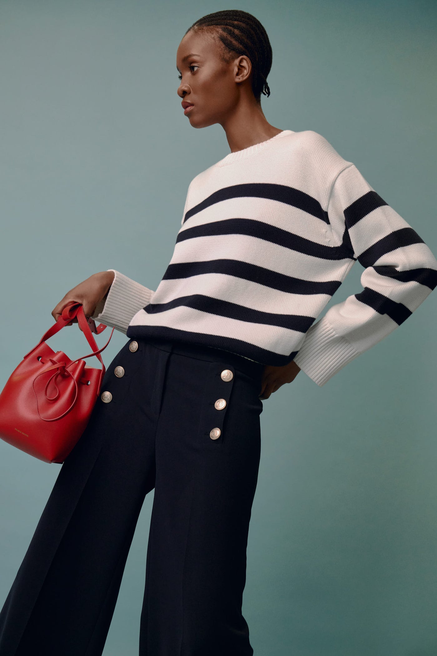 white +warren stripe sweater and seductive bridget pants accessorized with a mansur gavriel mini bucket bag