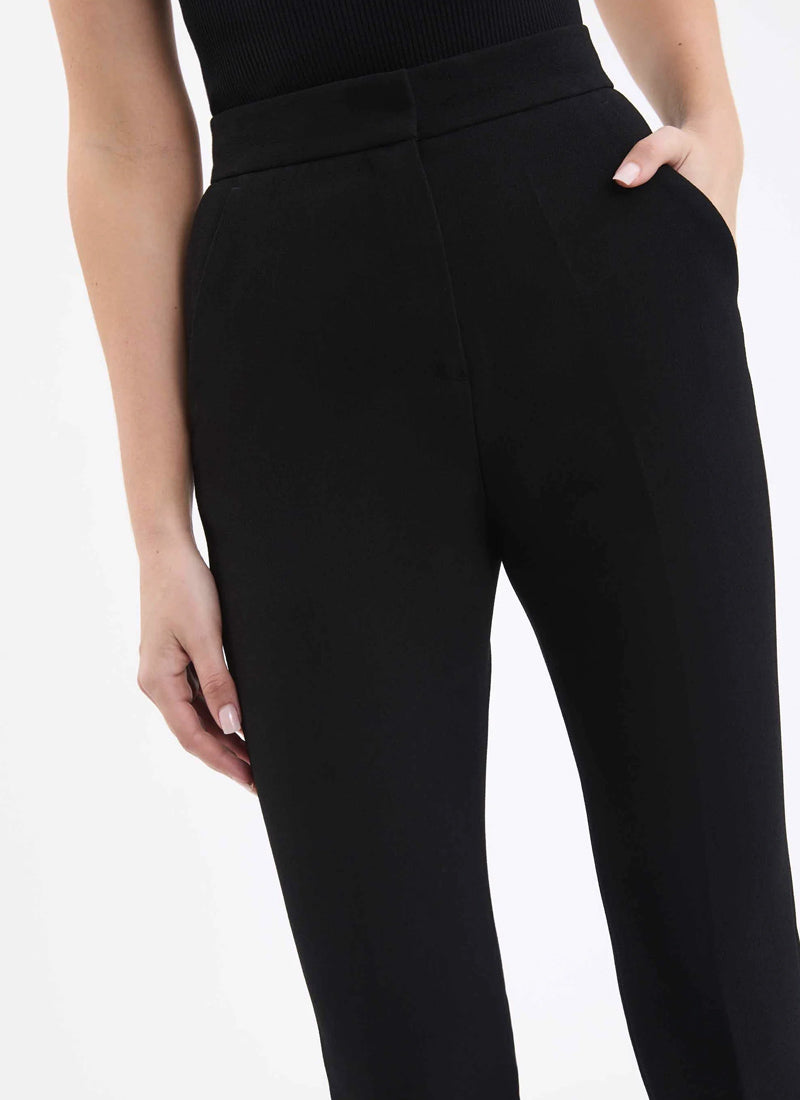 Evie high-rise split-hem pants in black - Rebecca Vallance